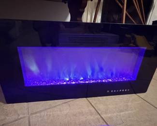 Electric wall fireplace - changes colors 