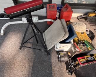 Gas cans, old propeller, man stuff