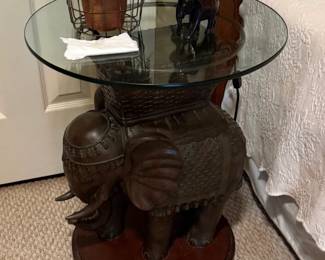 Elephant base round glass side table