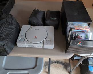 Sony PlayStation 1 Console and Game Storage Rack