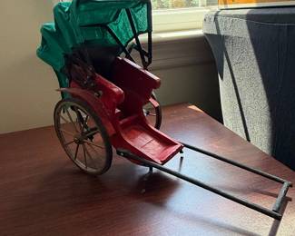 Vintage Red Rickshaw Model with Green Canopy