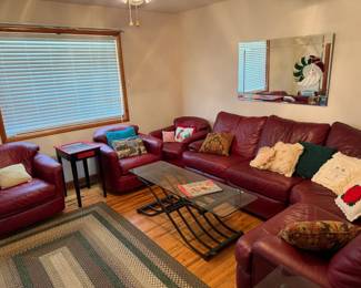 red sectional, chairs, tables