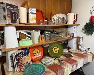 cookbooks, cracker tin, Tupperware, vintage kitchen tools