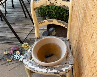 chair with flower pot