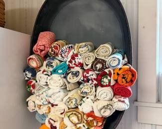 kitchen towels shown in oval container hanging on the wall