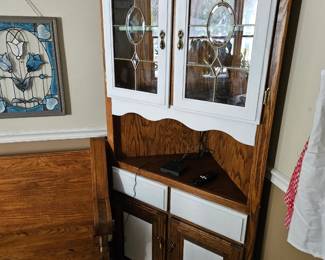 Corner curio cabinet