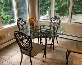 Modern metal and glass table with 4 chairs