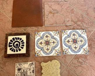 292 lotofsevendecorativetilesandtrivet