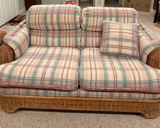 Rattan loveseat with custom cushions
