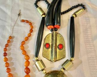 Egg Yoke Amber, and Gold Tone Necklaces 