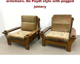 Lot 1519 Pair of Brutalist French Oak lounge armchairs. De Puydt style with pegged joinery