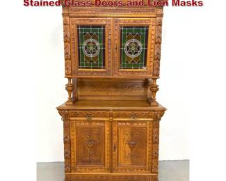 Lot 1704 2pc Carved Oak Buffet Hutch with Stained Glass Doors and Lion Masks