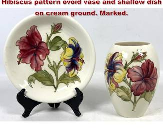 Lot 1814 2pc Walter Moorcroft Pottery Hibiscus pattern ovoid vase and shallow dish on cream ground. Marked.