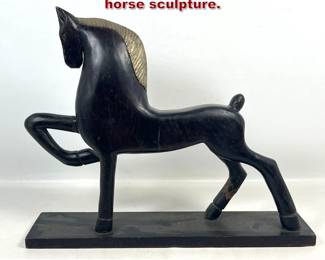 Lot 1849 Stylized Folk Art carved wood horse sculpture. 