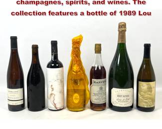 Lot 2000 7pcs vintage and modern champagnes, spirits, and wines. The collection features a bottle of 1989 Lou