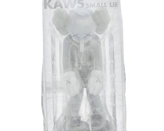 108 Brian "KAWS" Donnelly (b. 1974) "Small Lie" (grey), 2017 Painted cast vinyl Signed, dated, and titled in marker to the underside of left foot; further marked under right foot: KAWS..17 / Medicom Toy / China Figure height 11 in., width 5 in., depth 4 1/2 in.; packaging height 12 in., width 6 1/4 in., depth 6 in. Estimate: $400 - $600