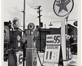 36 Berenice Abbott (1898-1991) "Gasoline Station, Tremont Avenue and Dock Street, Bronx," circa 1937, from "New York Portfolio III" Gelatin silver print on paper, dry mounted to a mat board support, as issued Edition: 58/60, printed circa 1979 Signed and numbered in pencil on the mount: Berenice Abbott; Parasol Press, Ltd., New York, NY, pub., with their black ink stamp on the verso of the mat board support Image/Sheet: 19 1/2 x 15 1/2 in.; Mat board support: 24 1/8 x 19 5/8 in. Estimate: $1,500 - $2,500