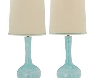 138 A pair of Marbro Lamp Co. art glass lamps Mid/late 20th century Each with applied factory fixture label numbered: 6513 With brass standard and fixtures, each issuing a single light with fabric shade, electrified 2 pieces Each height without harp 32 1/4 in., diameter 10 3/4 in.; height of shades 18 14/ in., diameter 16 1/4 in.; overall height 41 1/2 in. Estimate: $300 - $500