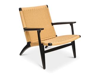 41 Hans Wegner (1914-2007) A CH25 Easy Chair for Carl Hansen & Son, late 20th/early 21st century Marked to applied metal label: CARL HANSEN & SON / PASSIONATE CRAFTSMANSHIP / Hans J. Wegner [signature] / DESIGN BY HANS J. WEGNER / MADE IN DENMARK / SERIAL NO. / 362541 The enameled wood frame with cording to seatback and seat Height 29 in., width 27 3/4 in., depth 30 1/4 in. Estimate: $700 - $900