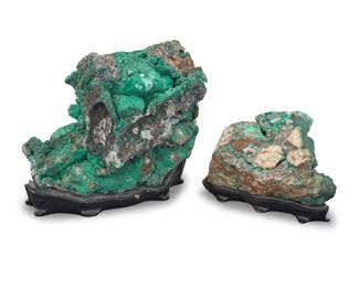 52 Two malachite specimens Democratic Republic of the Congo The larger with rough overgrowth, each raised on a custom-fitted black stand 2 pieces Overall height or larger 14 3/4 in., width 16 3/4 in., depth 8 3/4 in.; overall height of smaller 9 in., width 13 in., depth 8 1/2 in. Estimate: $300 - $500