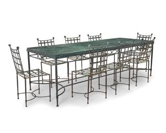 128 Mario Papperzini (20th Century) An 'Amalfi' dining suite for John Salterini, mid-20th century Comprising a green marble-top table raised on a wrought-iron frame, and eight side chairs each with lattice seat and seatback 9 pieces Table height 30 in., length 96 1/4 in., depth 36 1/2 in.; height of chairs 35 in., width 17 in., depth 19 1/4 in. Estimate: $3,000 - $5,000