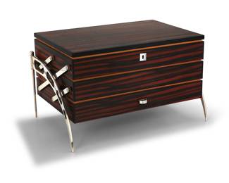 13 A Dunhill 'Normandy Bridge' humidor 2004 Edition: 2/50 Inscribed and numbered to metal plaque: ALFRED DUNHILL / Normandy Bridge Humidor Macassar ebony veneer, cedar, and rhodium-plated metal, comprising three articulated compartments Height 9 5/8 in., width 16 in., depth 10 3/4 in. Estimate: $500 - $700