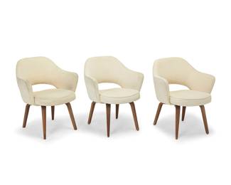 39 Eero Saarinen (1910-1961) A set of three armchairs model 71 for Knoll, mid-20th century Each unmarked With bentwood frames with canvas upholstery 3 pieces Height of each 32 in., width 26 1/4 in., depth 24 in. Estimate: $1,000 - $1,500