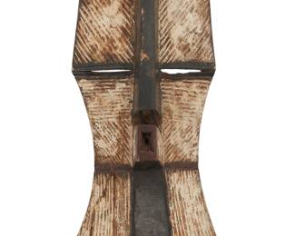 167 An African Kifwebe carved wood mask 20th century, Luba or Songye; Democratic Republic of the Congo Incised and pigmented wood Height 27 in., width 12 1/4 in., depth 9 in. Estimate: $300 - $500