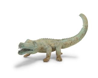 169 A patinated bronze model of an alligator Late 20th/early 21st century Unmarked Height 27 1/2 in., width 43 in., depth 30 in. Estimate: $400 - $600