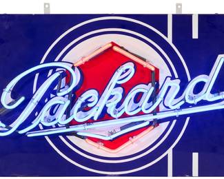 103 A reproduction Packard neon sign Late 20th century Enameled porcelain on metal, electrified Height with mounting brackets 21 1/2 in., width 30 1/2 in., depth 9 in. Estimate: $500 - $700
