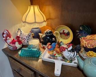 Chickens, roosters, tureen, teapots, covered glass butter dish. 