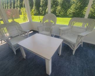 Patio furniture set with a table