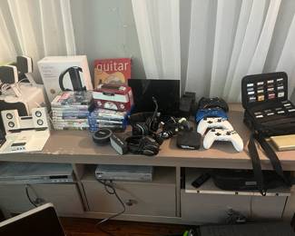 Xbox and PS games, Game boy with Games, controllers, speakers, routers, DVD players