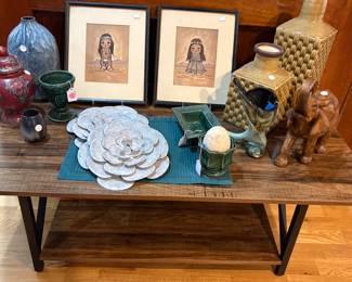 Small modern coffee table with pottery and cute Native American prints
