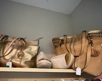 Michael Kors purses.