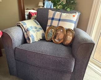This is a super comfy occasional chair in one of the bedrooms.