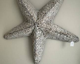 This is a sweet large decorative woven rattan star.
