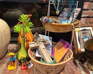 Fun and colorful jewelry, Mexican items, and a sand painting.