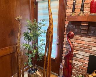 Tall decorative giraffes.