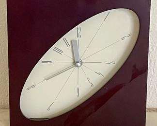 OVAL-FACE WALL CLOCK