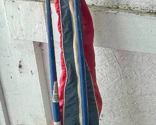 SET OF VINTAGE SKIIS AND POLES WITH TRAVEL CASE