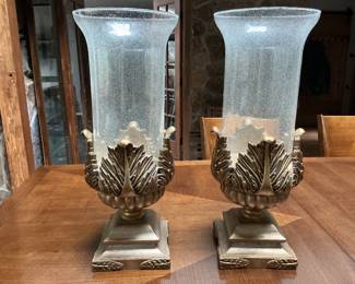 Tall hurricane candle holders. Gold tone base.