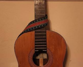 Needs Strings; Has stand.