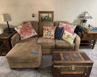 Several pieces of furniture including vintage trunks