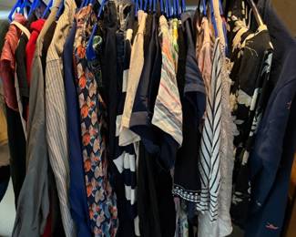 Lots of woman's clothing, various sizes and styles