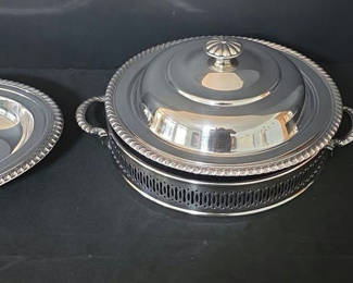 Lot 69: Silver-plated serving set with tray, chafing dish, and bowl