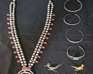 Lot 65: Silver jewelry collection with necklace, bracelets, and animal pins