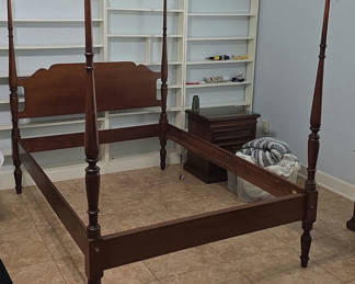 Lot 20: Dark wood four-poster bed frame