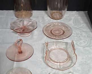 Lot 11: Pink glassware including pitchers and serving dishes