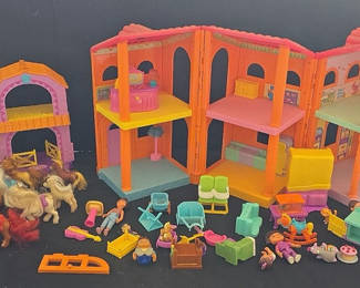 Lot 2: Colorful plastic dollhouse with pony figures and accessories